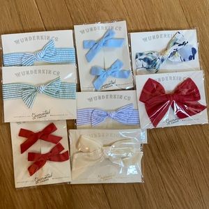Lot of Wunderkin Co bows and headbands.
